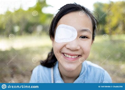 Maybe you would like to learn more about one of these? Happy Asian Child Girl Cover With Blindfolded Bandaged Eye After Surgery Or Treatment Of ...