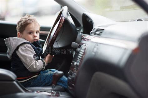 Little Boy Driving A Car Stock Photo Image Of Caucasian 74084374