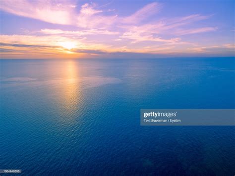 Scenic View Of Seascape Against Sky During Sunset High Res Stock Photo