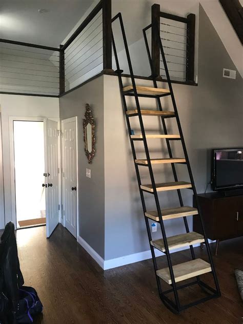There Is A Ladder In The Corner Of This Room That Leads Up To The Loft