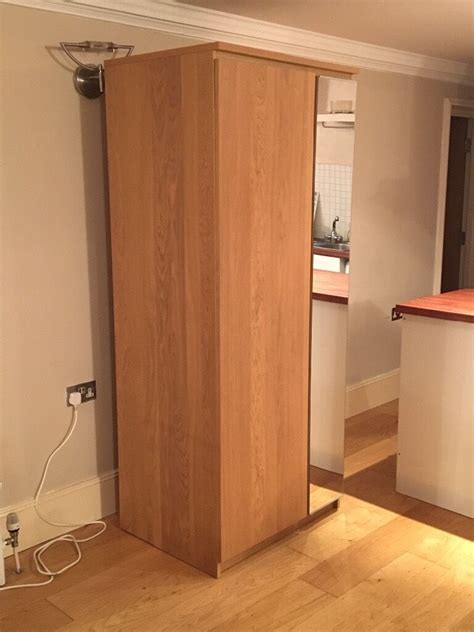 You can fit more than you think in a limited area. IKEA Malm oak wardrobe with mirror like new | in ...