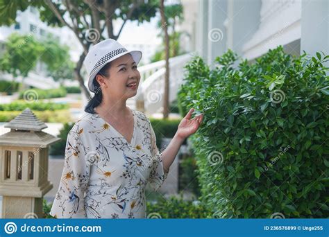 Portrait Senior Asia Woman Wear A Hat In Garden Stock Image Image Of