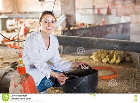 Female Worker Holding Plastic Bucket Stock Photo Image Of Hangar