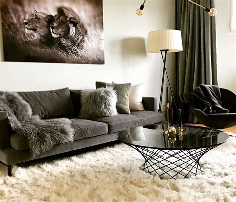 Velvet looks and feels luxurious and can be used on upholstered beds, arm chairs, sofas, curtains or throw pillows allowing you to add as little or as much as you want to liven up your look. Grey velvet sofa living room. | Velvet sofa living room