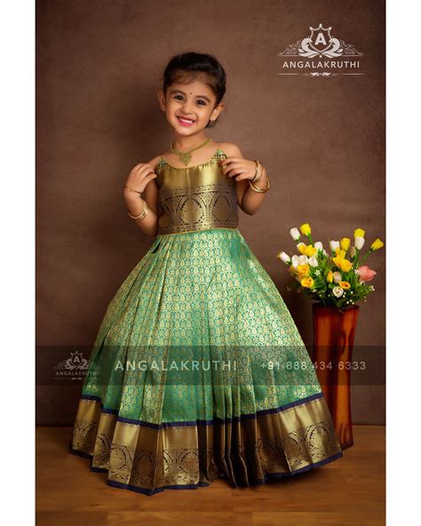 Thinking to wear uniquely for your kids? Kids Pattu pavadai designs by Angalakruthi Bangalore ...