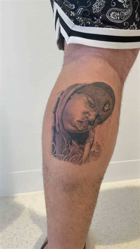 Notorious Big Portrait Tattoo Located On The Calf