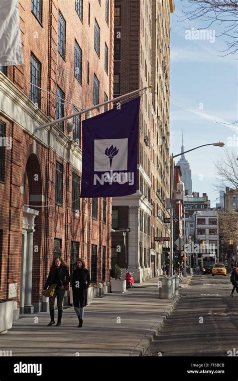 New York University Buildings With The Purple Nyu Logo Flag Hanging