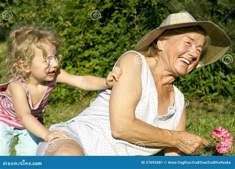 Grandma And Granddaughter Play In Garden Stock Image Image Of Female