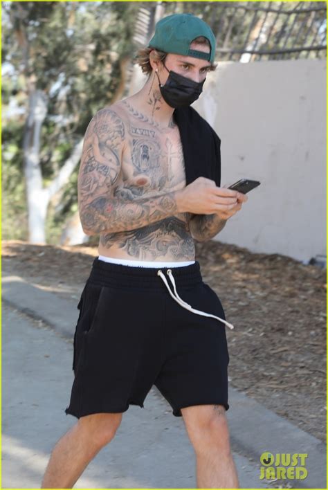 full sized photo of justin bieber shirtless for hike 10 justin bieber shows off his tattoos