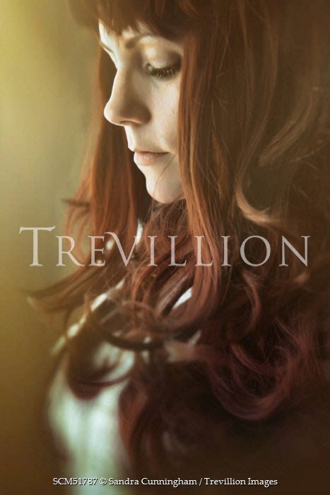 Trevillion Images Sandra Cunningham Thoughtful Red Haired Woman Pe8