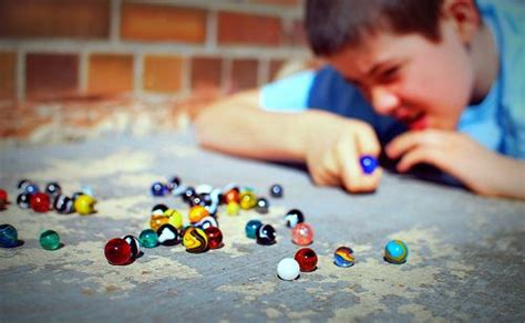25 Fun Games To Play With Marbles Everythingmom