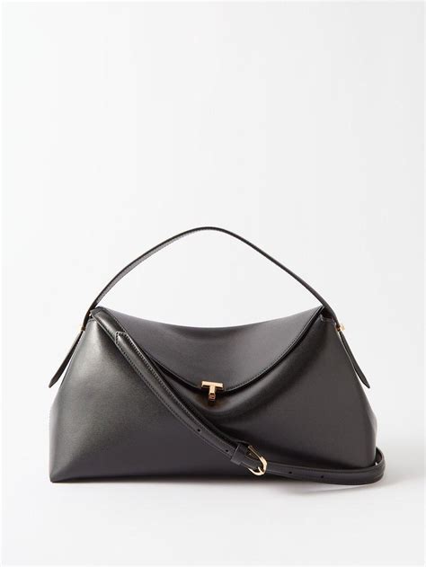 T Lock Leather Shoulder Bag By Toteme Jellibeans