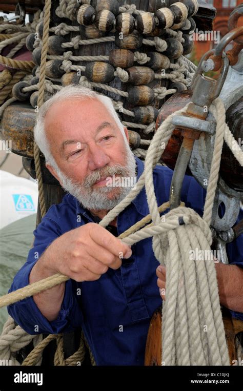 Sailor With Rope And Tackle On An Old Sailing Ship Stock Photo Alamy