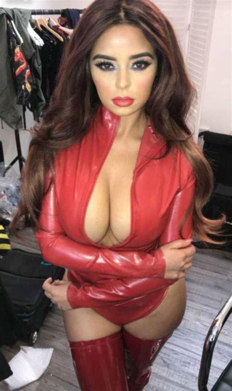 Demi Rose Flaunts Her Eye Popping Assets In Low Cut Blouse Daily Mail