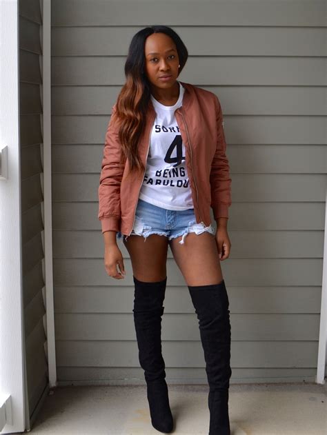 thigh high boots mixed with short shorts creates the illusion of long legs boots fashion