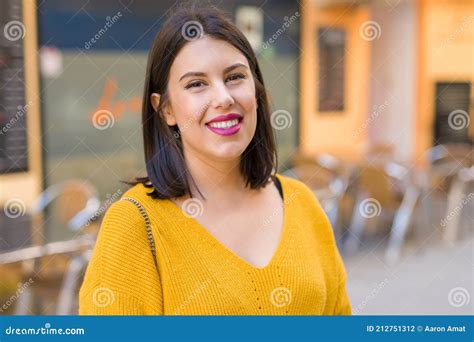 Beautiful Young Woman Smiling Cheerful Walking On The Street On A Sunny