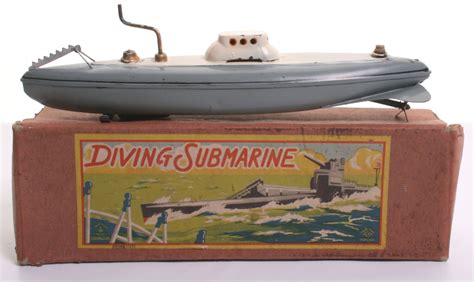 scarce ck japan tinplate clockwork submarine grey with white deck winding handle fully work