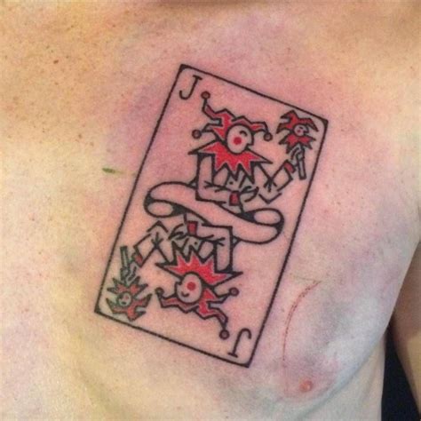 It can also be used to symbolize misfortune and deceit. Hand poked joker playing card tattoo on the chest. | Tetoválás