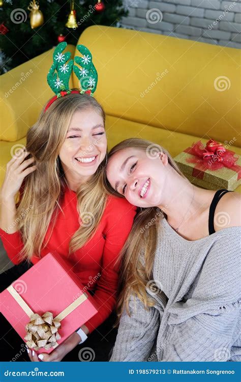 Smiling Caucasian Couple Sister Is Laughing Happily In Christmas Party Lifstyle Of Teenage