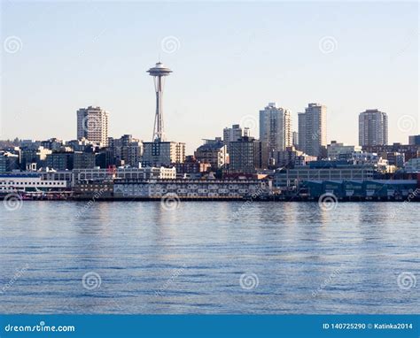 View Of Seattle Waterfront From The Sea At Sunset Editorial Image