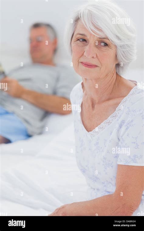 Mature Woman Sitting In Bed Hi Res Stock Photography And Images Alamy