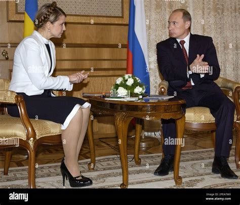 Russian Presidsent Vladimir Putin And Ukrainian Prime Minister Yuliya