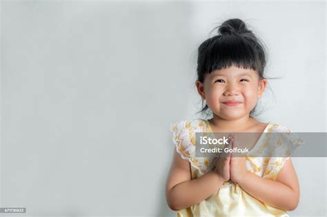 Cute Thai Girl In Thai Dress Costume In A Welcome Pose Hello Sawasdee