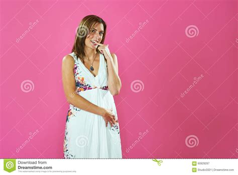 Model Biting The Finger On Pink Background Stock Image Image Of Mouth