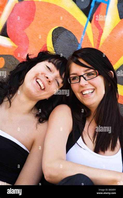 Two Women Laughing Together Stock Photo Alamy