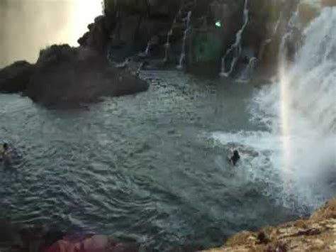 Jumping Into Angel S Pool Victoria Falls Zambia Youtube