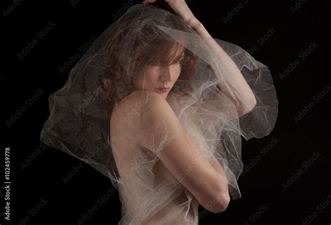 Nude Woman Wrapped In Sheer Tulle Fabric Stock Photo Adobe Stock