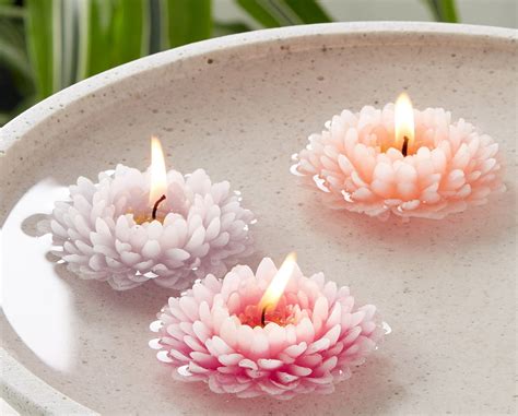 A Set Of Flower Shaped Candles Thatll Turn Your Bathtub Into A