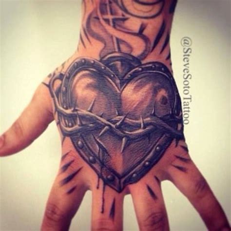 Handful Of Hearts Hand Tattoos For Guys Sacred Heart Tattoos Badass