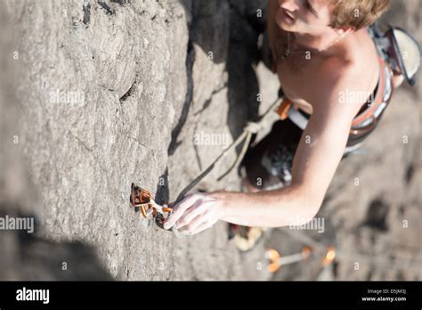 Climber Clipping The Rope In The Carabiner Stock Photo Alamy