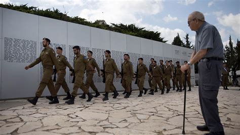 Israelis Gather At Cemeteries And Memorials To Mourn Their Fallen