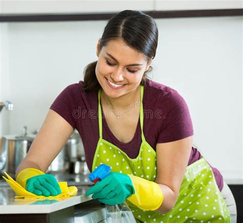 Housewife With Rag And Cleanser Cleaning Up Stock Image Image Of Kitchen Hygiene 205796859