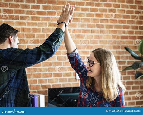 Caucasian Colleagues Give Each Other High Five Stock Photo Image Of