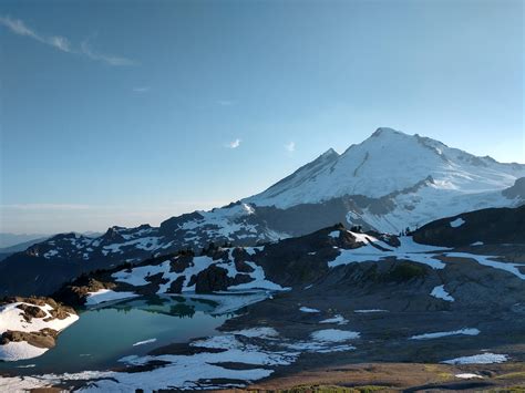 Campsites are scattered beneath a towering canopy of diverse forest. Mt Baker-Snoqualmie National Forest, Washington, USA ...