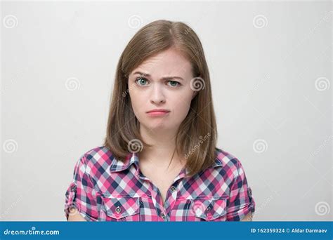 Young Caucasian Woman Girl With Questioning Puzzled Confused