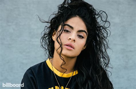 jessie reyez enlists 6lack for infectious new single ‘imported watch the music video