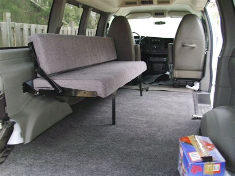 This Astro van incorporated a folding bed/ kitchen table ... Murphy bed hidden into a wardrobe.
