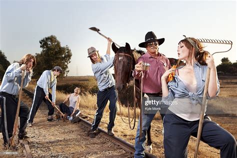 Sheriff Watching Criminals Working On Chain Gang Photo Getty Images