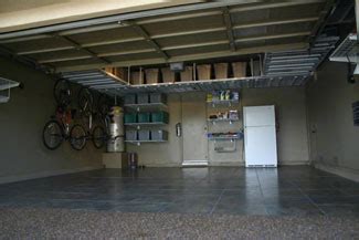 Get stuff off the floor and give everything a place of its own. Garage Overhead Storage Systems Cary NC, Shelving ...