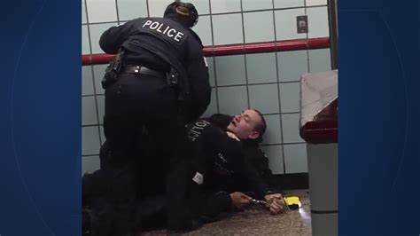 Video Shows Chicago Officer Shooting Subway Rider In Back