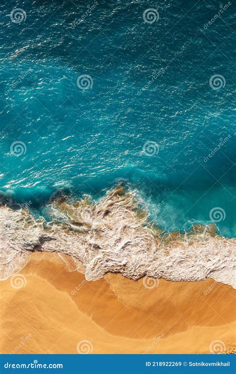 beautiful sandy beach with blue sea vertical view drone view of tropical blue ocean beach nusa