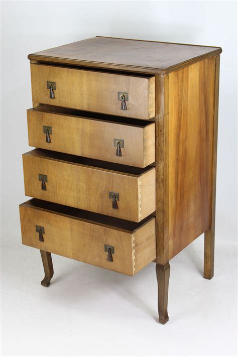 Good georgian walnut chest of drawers two half length drawers, over three full length drawers, bun feet, carved decoration verso, height 87 cm, width 93 cm, depth 54 cm approx. Small Art Deco Walnut Chest of Drawers