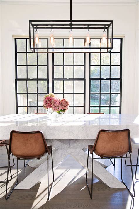 Measuring 29.5 h x 47.5 w x 47.5 d overall, this dining table comfortably seats six. 10 White Marble Dining Tables You'll Adore