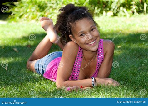 Young Black Teenage Girl Lying On The Grass Stock Image Image Of