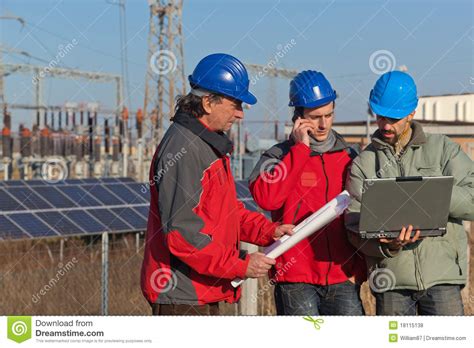 Three Engineers at Work stock photo. Image of energy - 18115138