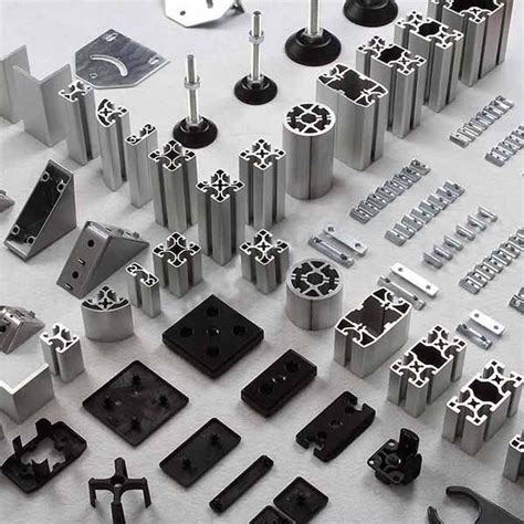 Various Metal Parts Are Arranged On A White Surface Including